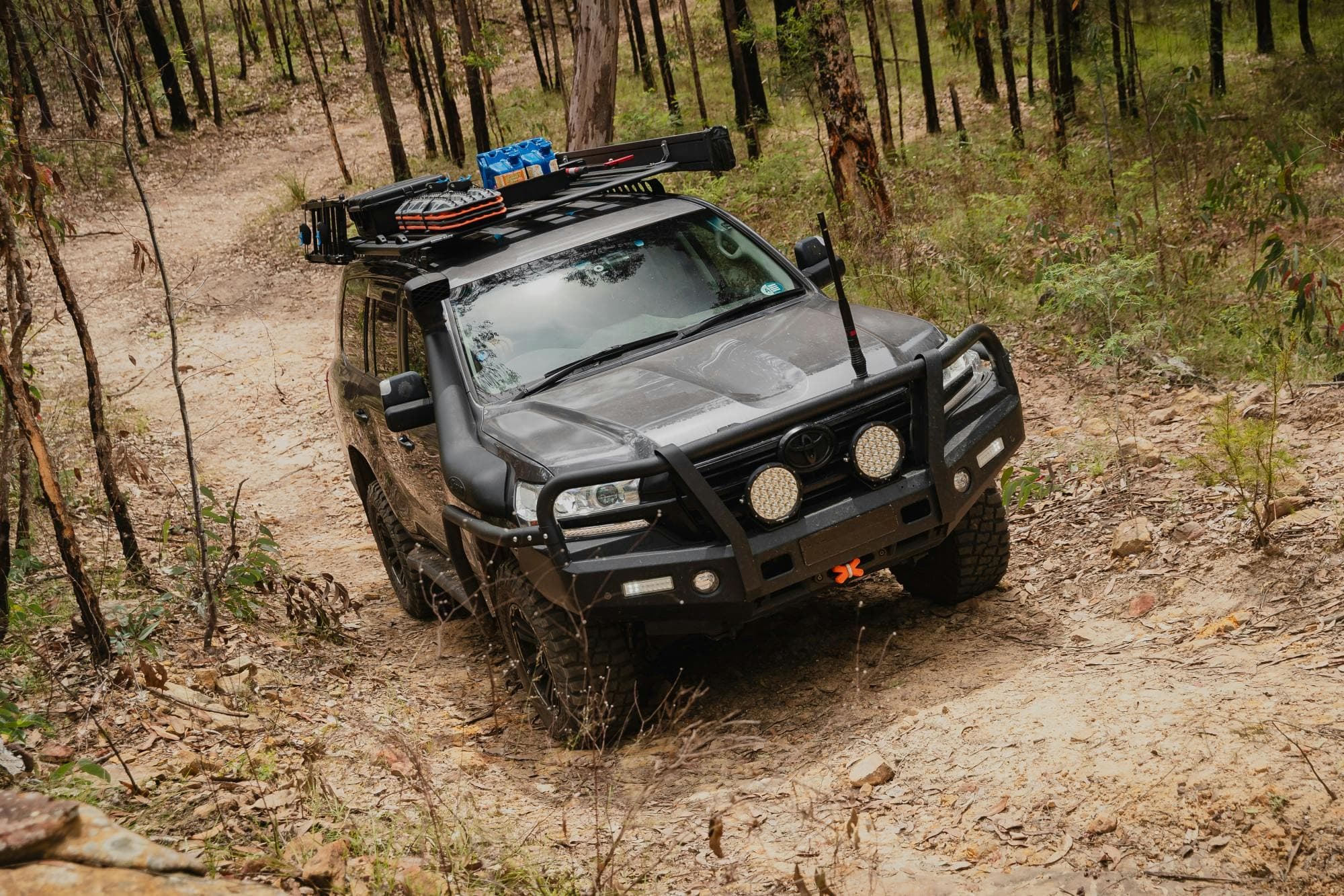 Overlanding Adventurer equipped with Maxtrax Recovery Boards